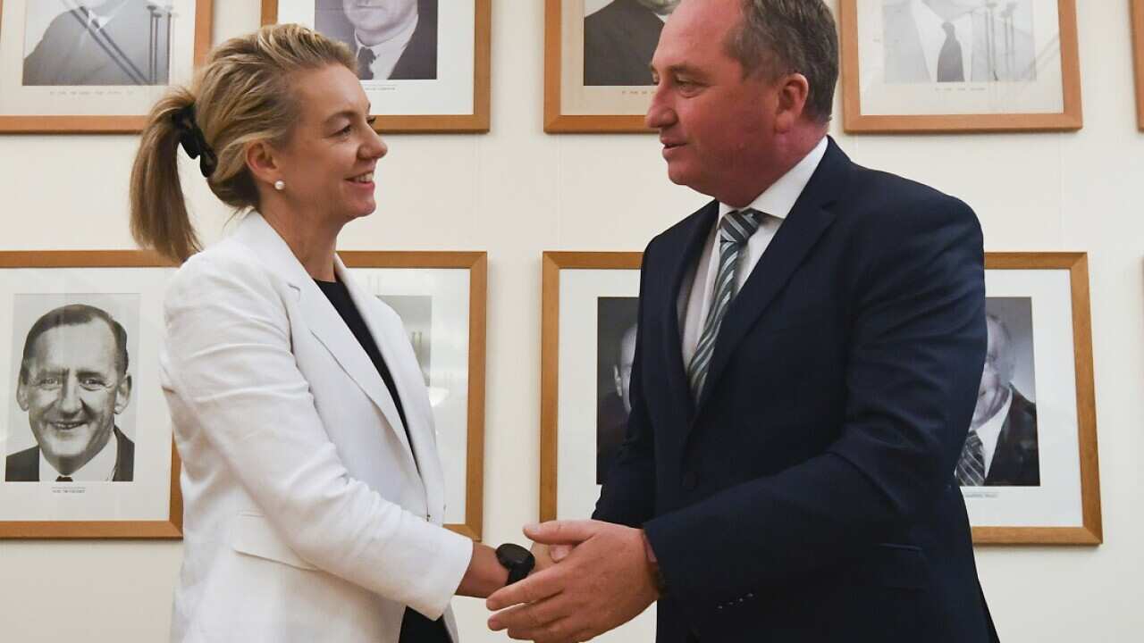 National Party leader Barnaby Joycecongratulates newly elected deputy leader of the Nationals Bridget McKenzie after a leadership ballot.