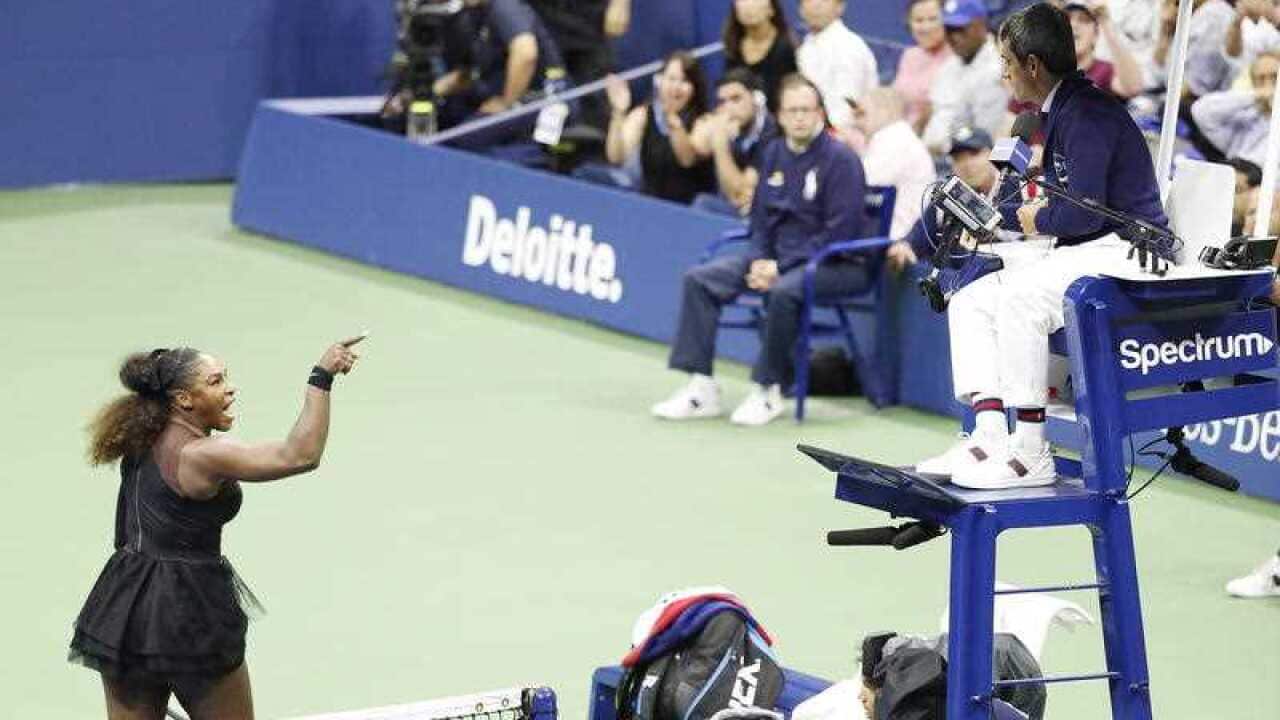 Serena Williams gestures towards chair umpire Carlos Ramos during the 2018 final.