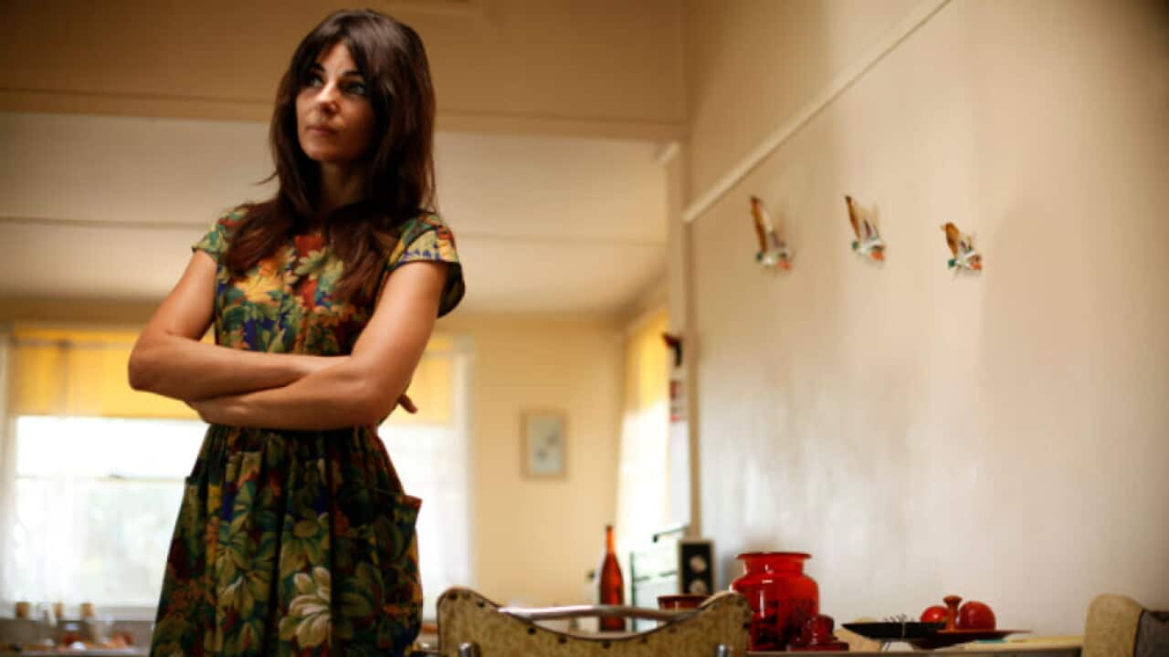 Silvia Colloca as Maria in "Little Tornadoes".