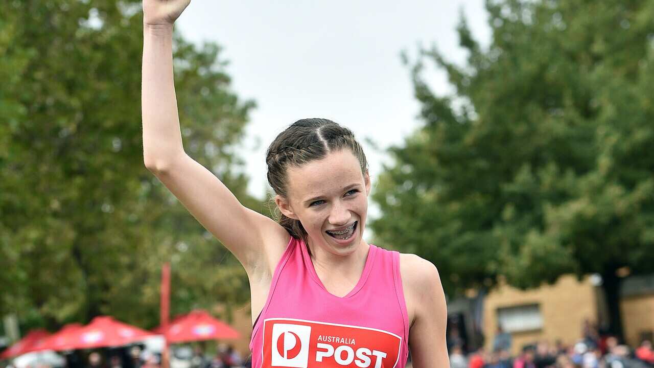 Talia Martin reacts after winning the womens Stawell Gift at Central Park in Stawell, Monday, March 28, 2016. (AAP Image/Julian Smith)