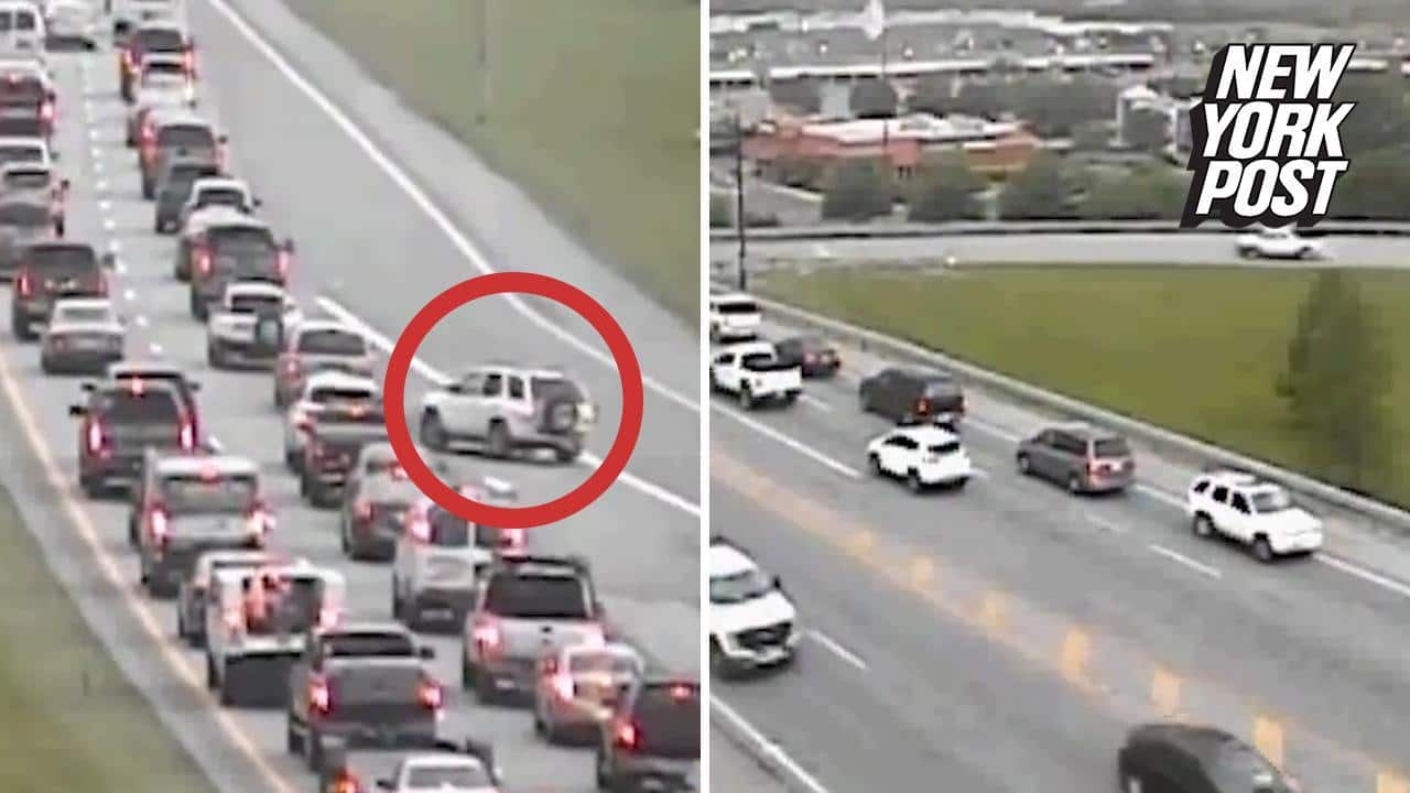 Driver pulls off brazen reverse maneuver on busy highway