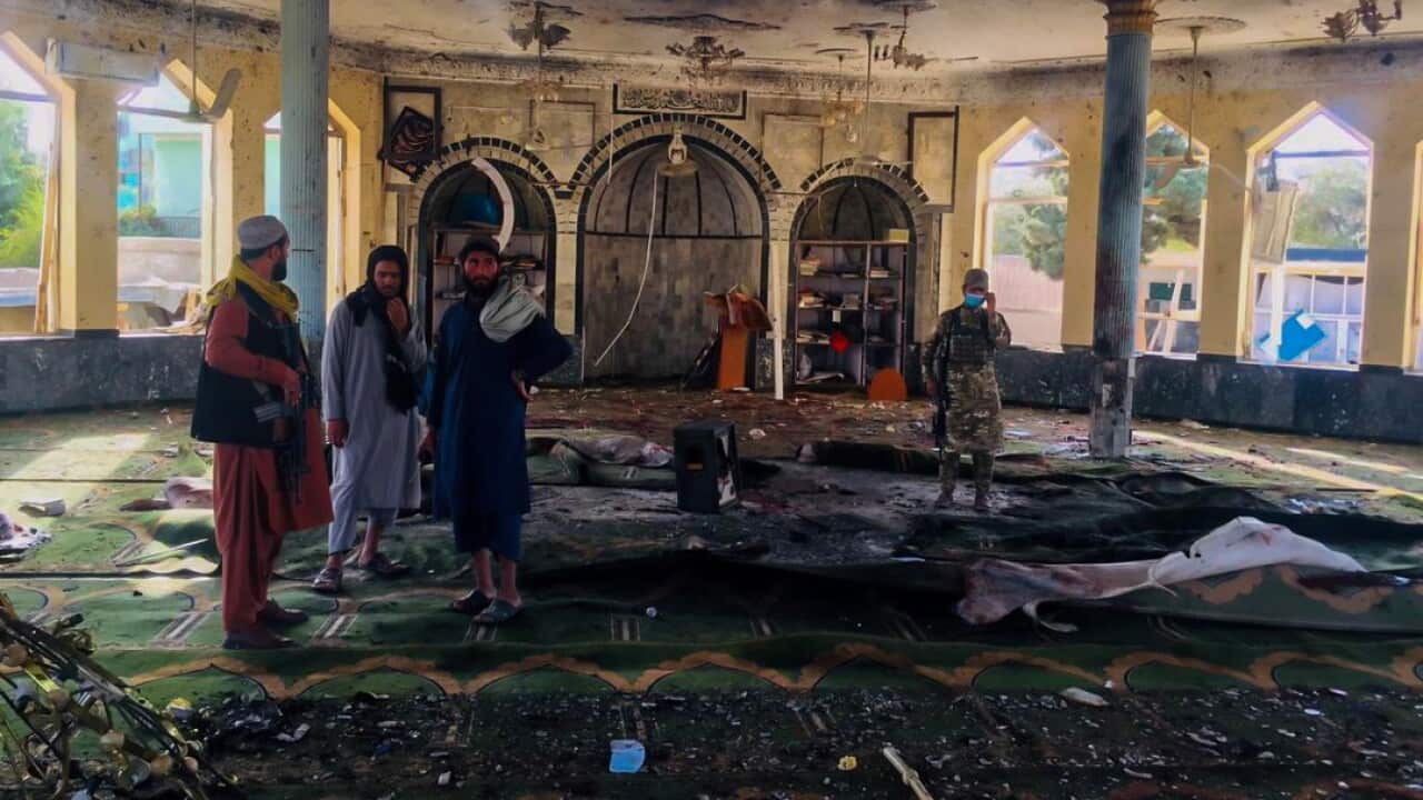 Taliban inspect the scene of a bomb blast that targeted a Shiite Muslims mosque in Kunduz, Afghanistan, 08 October 2021.
