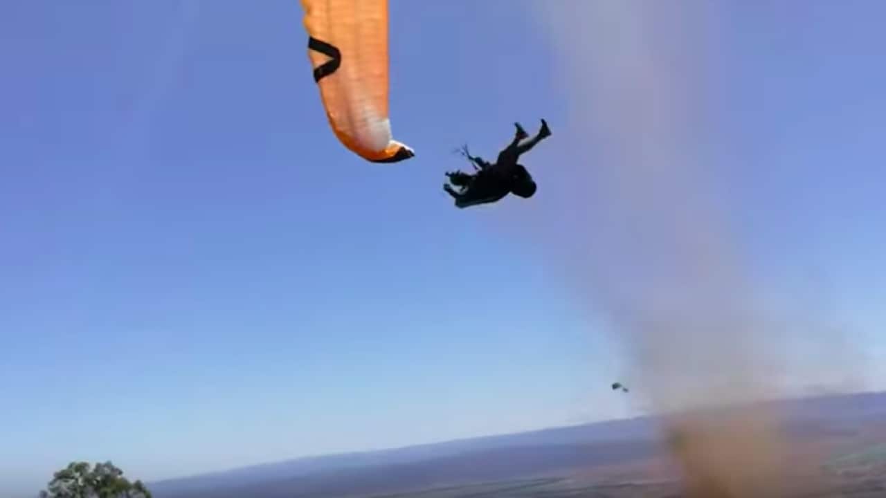 Paragliding caught in devil dust