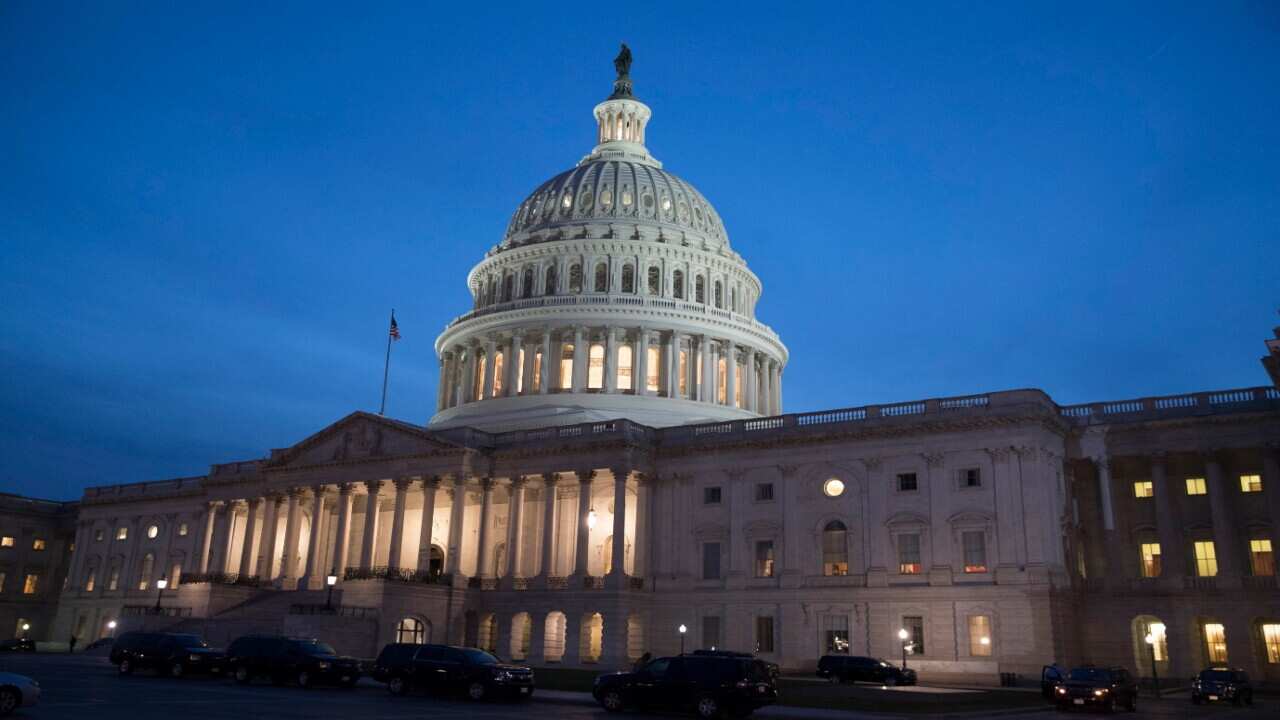 The US Capitol Building is seen after sunset in Washington, DC, USA, 30 November 2017.
