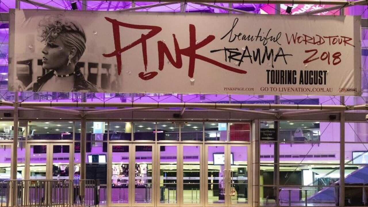 A Pink concert sign is seen outside Qudos Bank Arena
