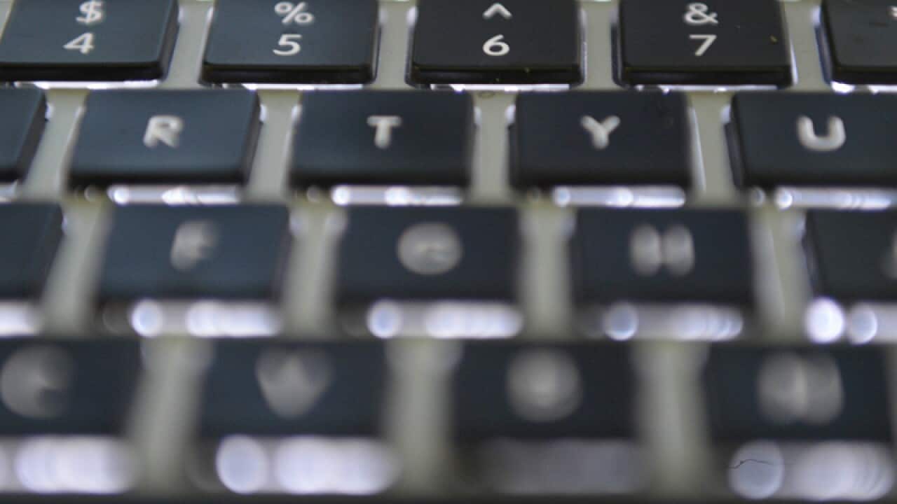 A computer keyboard is seen in Canberra