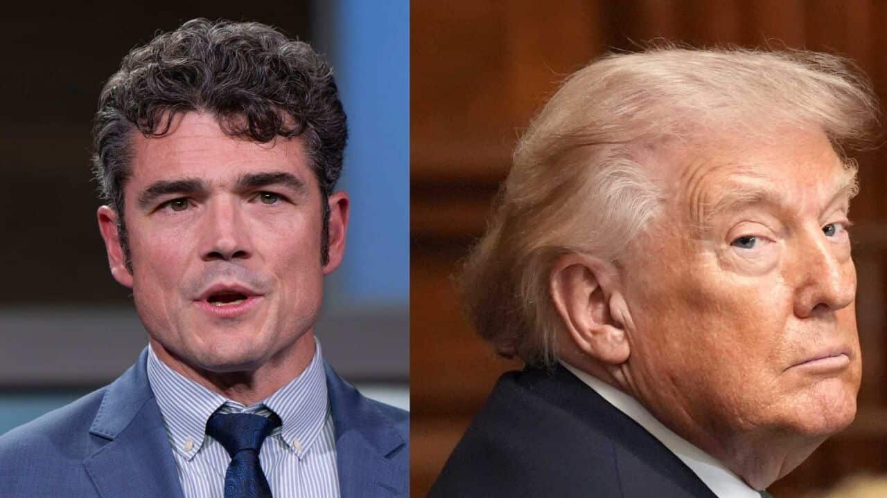 Top US counter-terrorism official Joe Kent and US President Donald Trump (AAP)