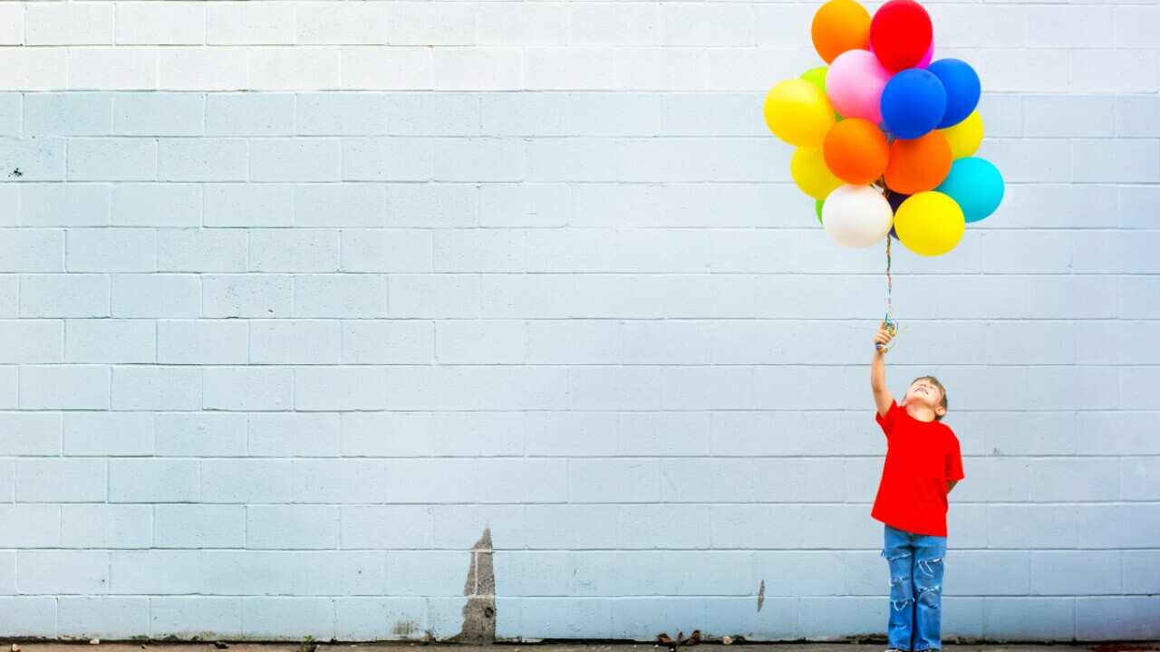 boy with balloons