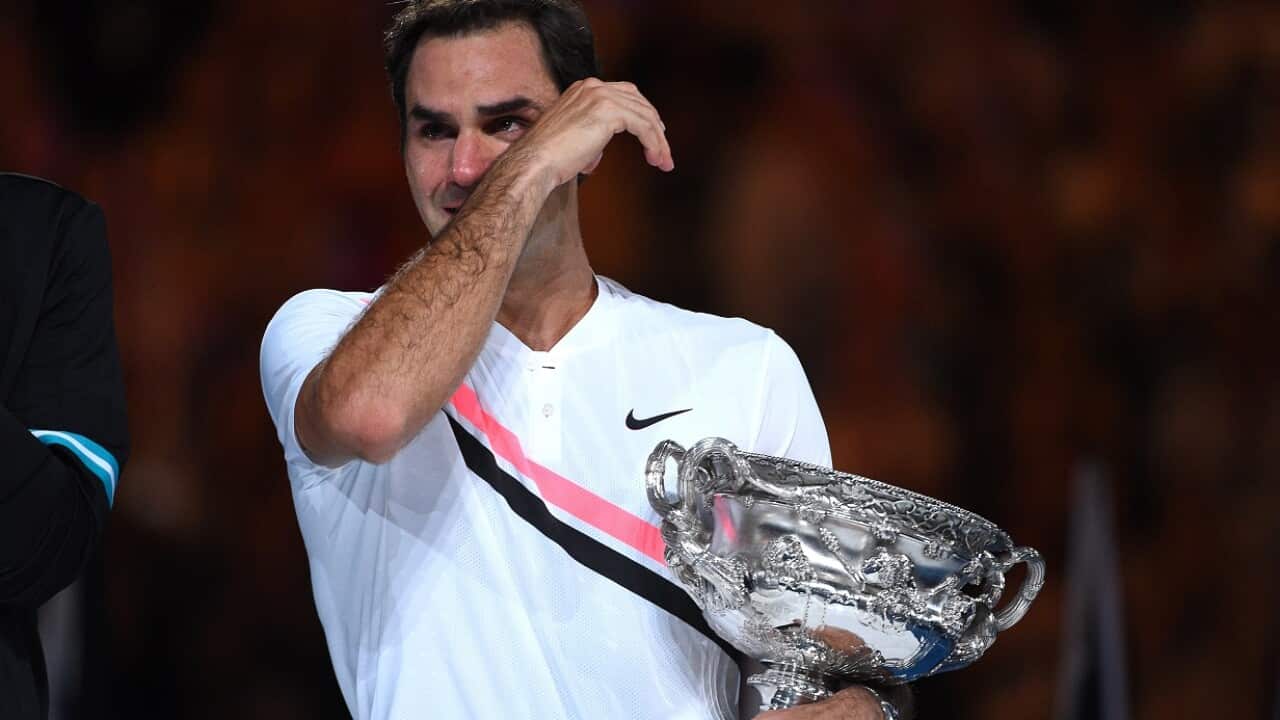 Roger Federer of Switzerland celebrates after winning the Men's Final against Marin Cilic of Croatia.