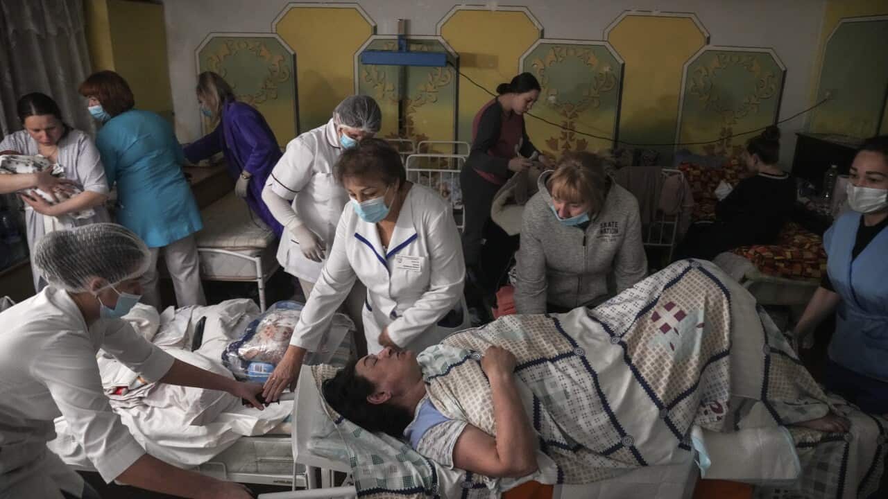 Patients in a crowded hospital room