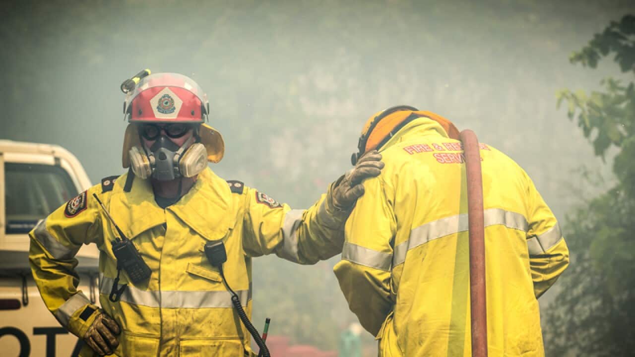 Firefighters fighting a bushfire in the Perth Hills