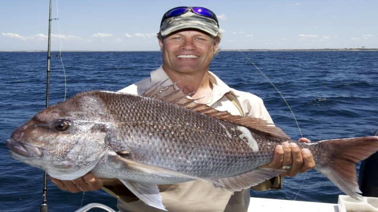 TV presenter Andrew ET Ettinghausen with a South Australian snapper