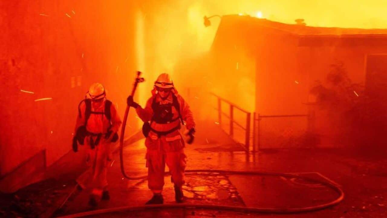 California wildfires spread with thousands fleeing