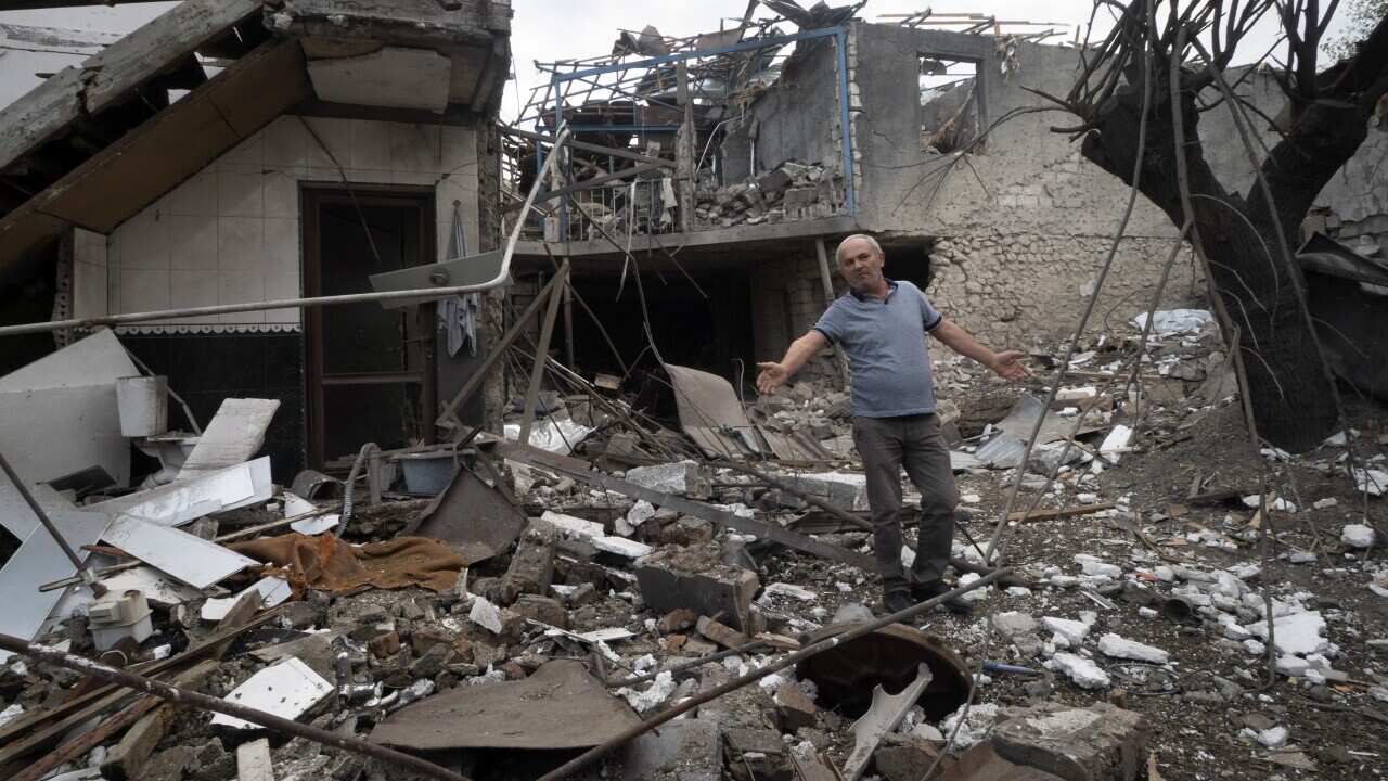 A house is destroyed by shelling in Stepanakert, the separatist region of Nagorno-Karabakh.