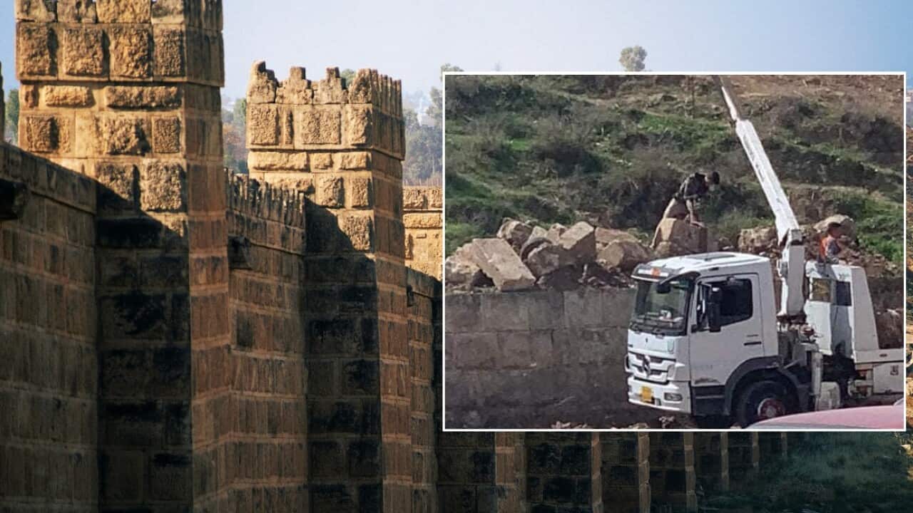 Damage to the ancient Nineveh wall (inset).
