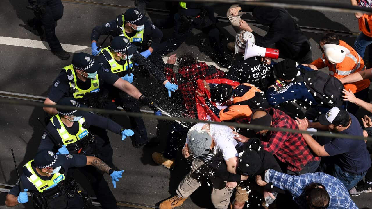 Anti-lockdown protesters clash with police in Melbourne.