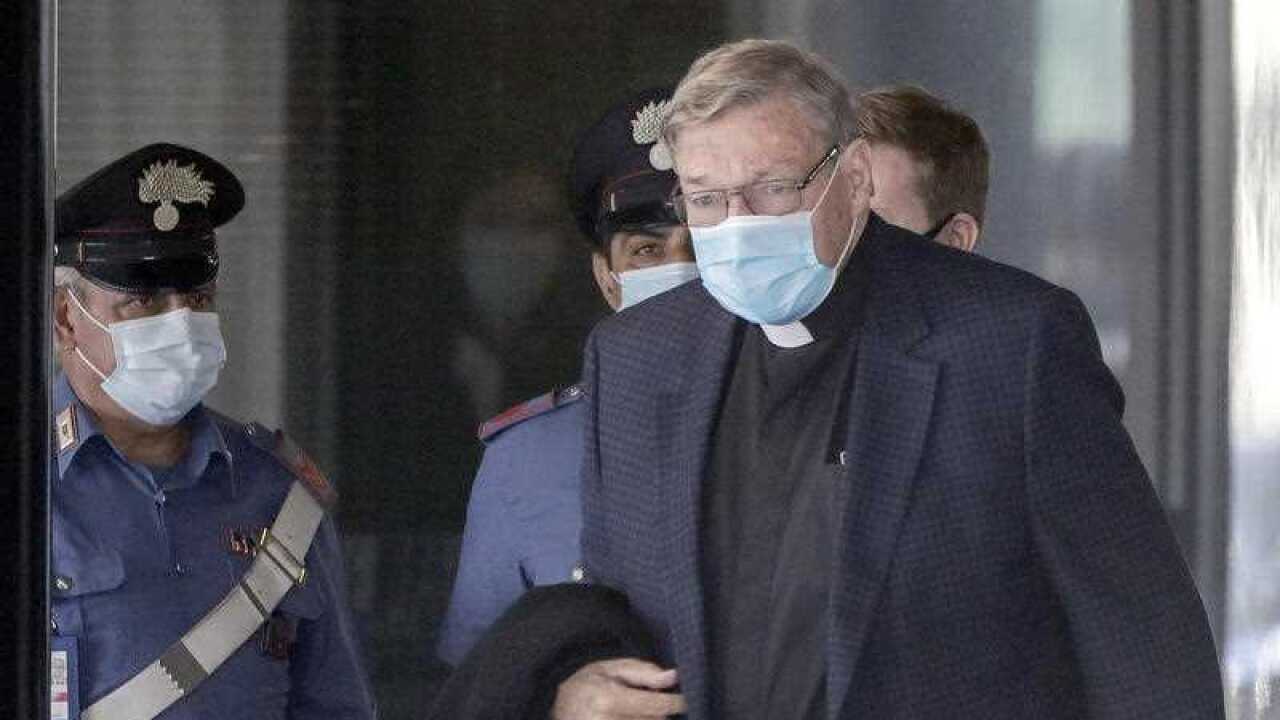 Australian Cardinal George Pell arrives at Rome's international airport in Fiumicino, Wednesday, Sept. 30, 2020.
