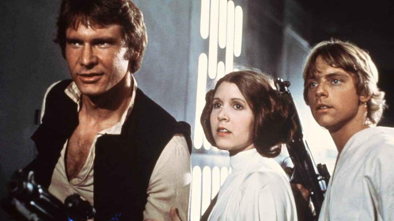 Harrison Ford, as Han Solo, Carrie Fisher, as Princess Leia Organa, and Mark Hamill, as Luke Skywalker from the 1977 "Star Wars" movie (AP Photo/20th Century-Fox Film Corporation)