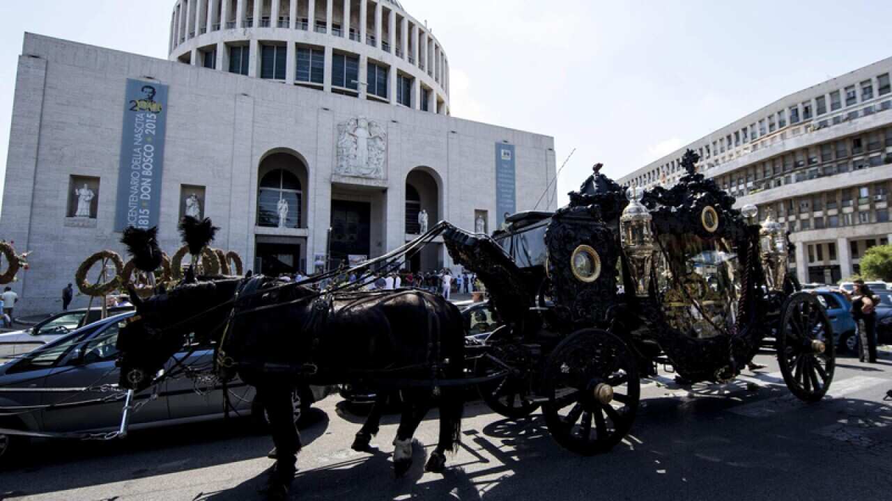 The carriage carrying the coffin of Vittorio Casamonica