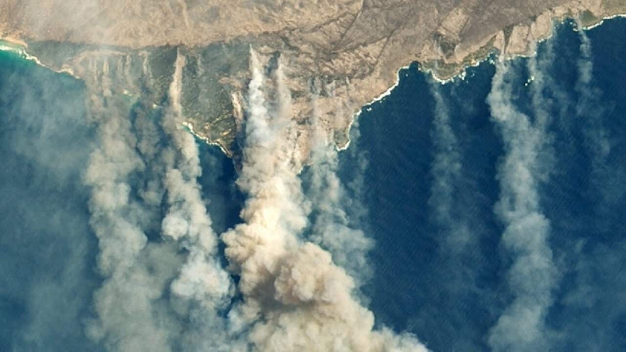 A satellite image showing burned land and thick smoke over Kangaroo Island, Australia on 9 January 2020.