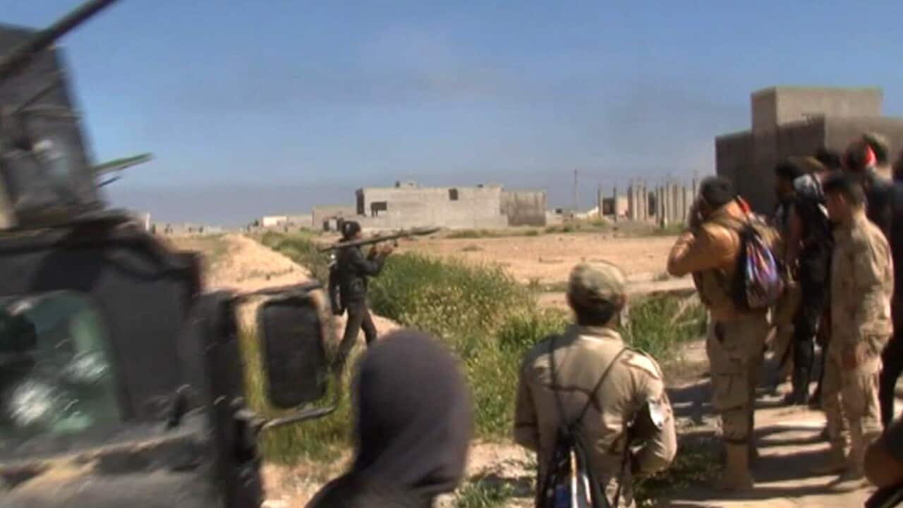 In this still image taken from video, a soldier fires a rocket propelled grenade in Tikrit, Iraq on March 11, 2015. (AP)