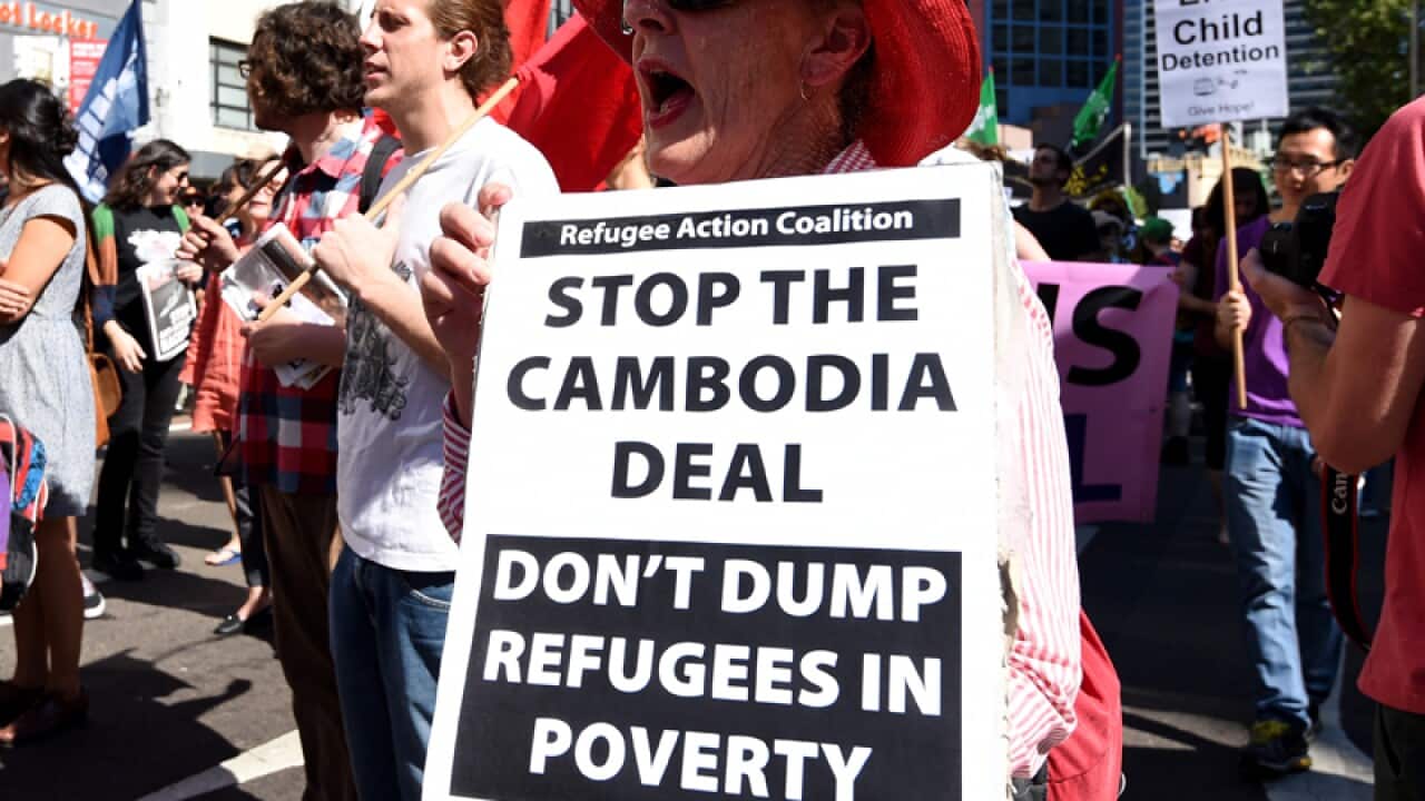 Demonstrators march during the Stand up for Refugees rally, in Sydney