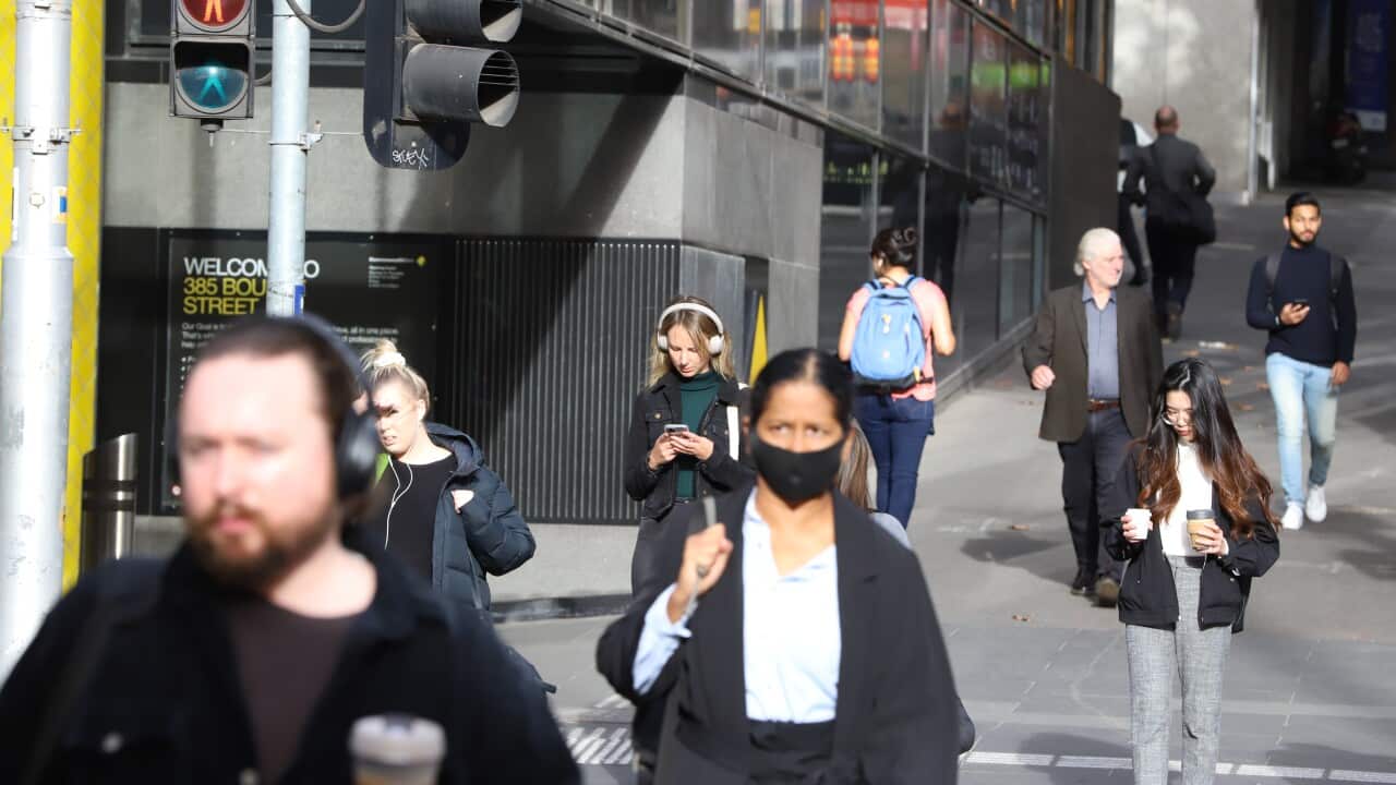 People walking down a street in Sydney