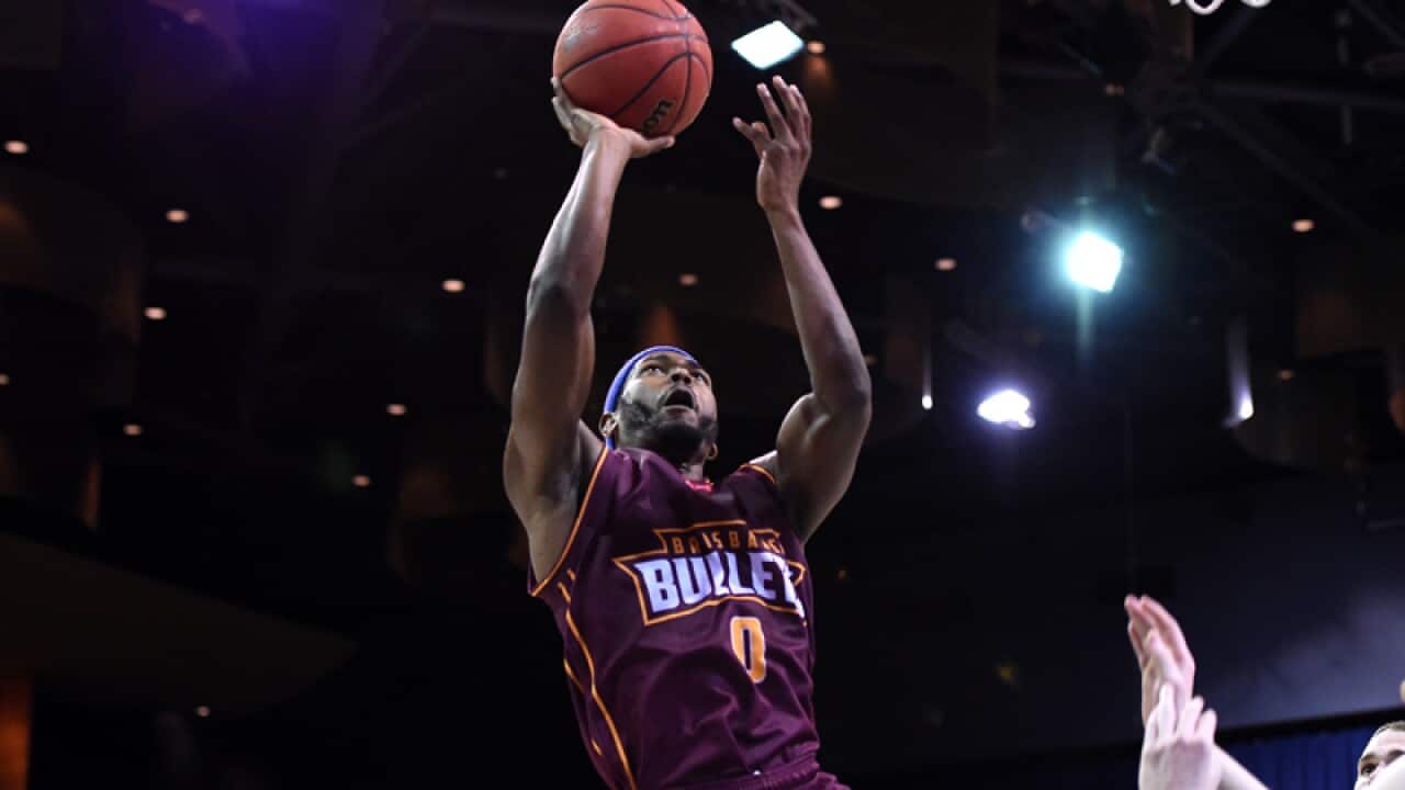 Jermaine Beal of the Brisbane Bullets (left)