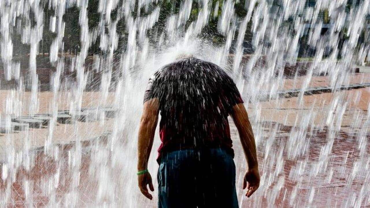 A man cools off in the heat.