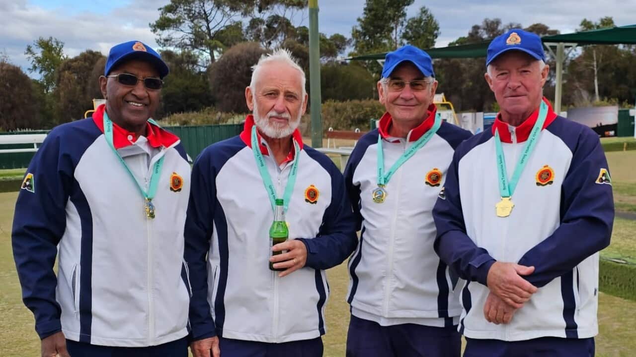 Belay with his Royal Hobart Bowls Club team.jpg