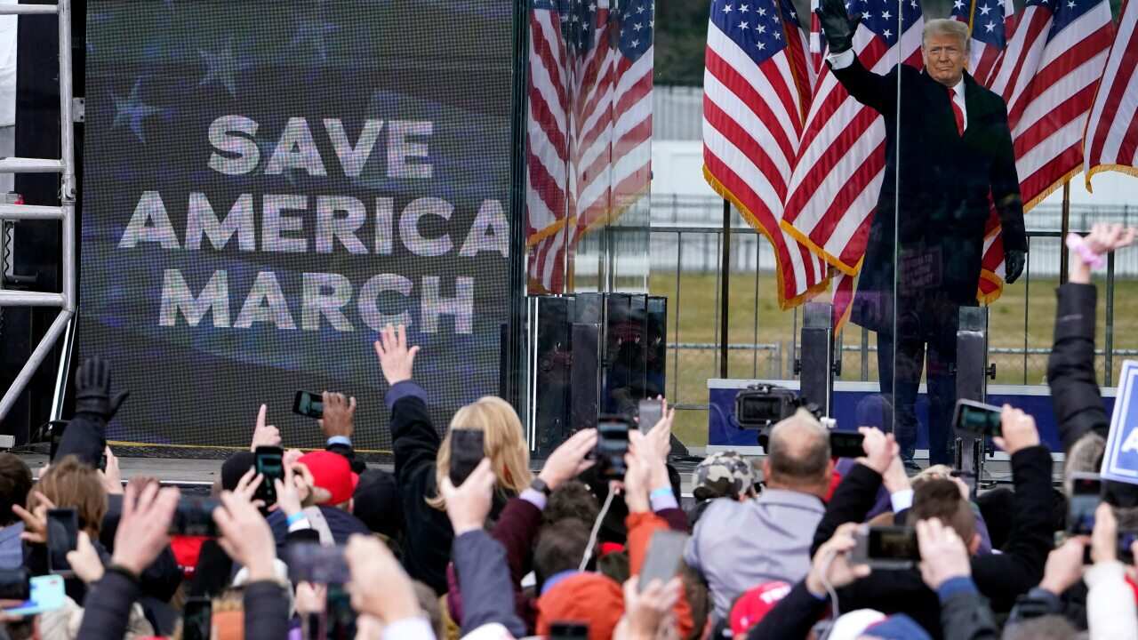 Former US president Donald Trump speaks to his supporters at a rally on 6 January. His supporters later stormed the Capitol building.