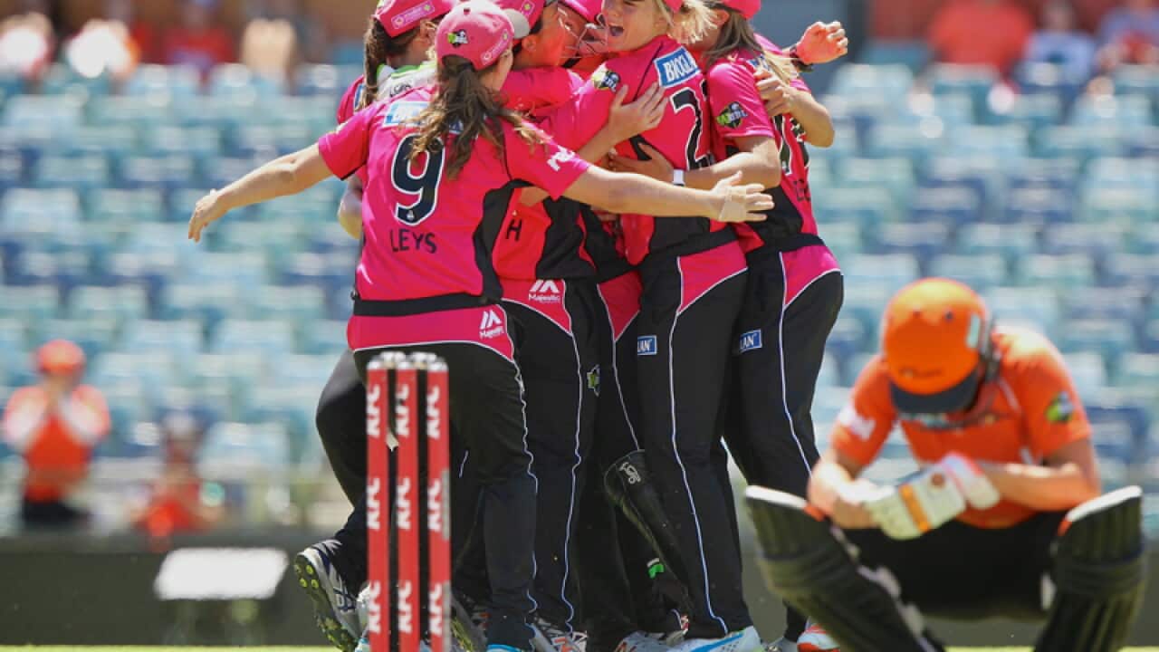 Katherine Brunt of the Scorchers reacts as the Sixers celebrate