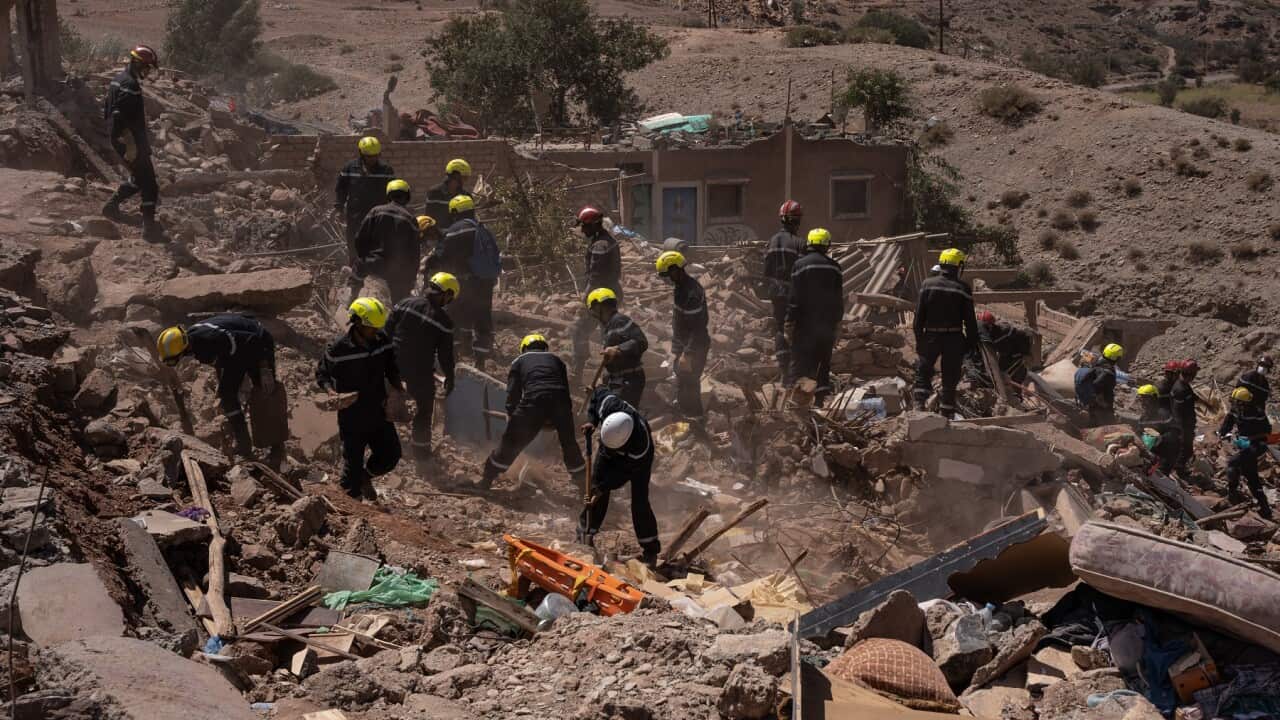 Rescuers working to find survivors in the rubble in the village of Talat NYaaqoub, Morocco