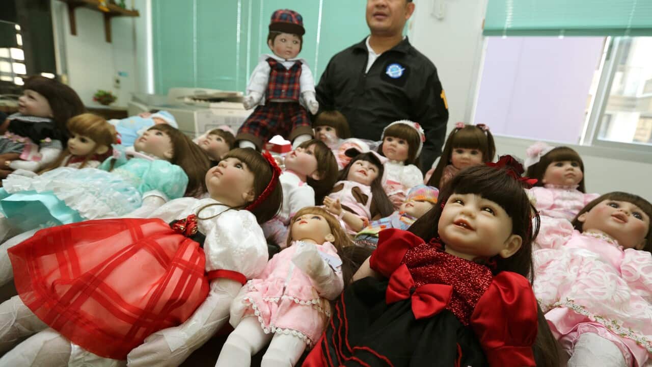 Child Angels dolls en-masse.