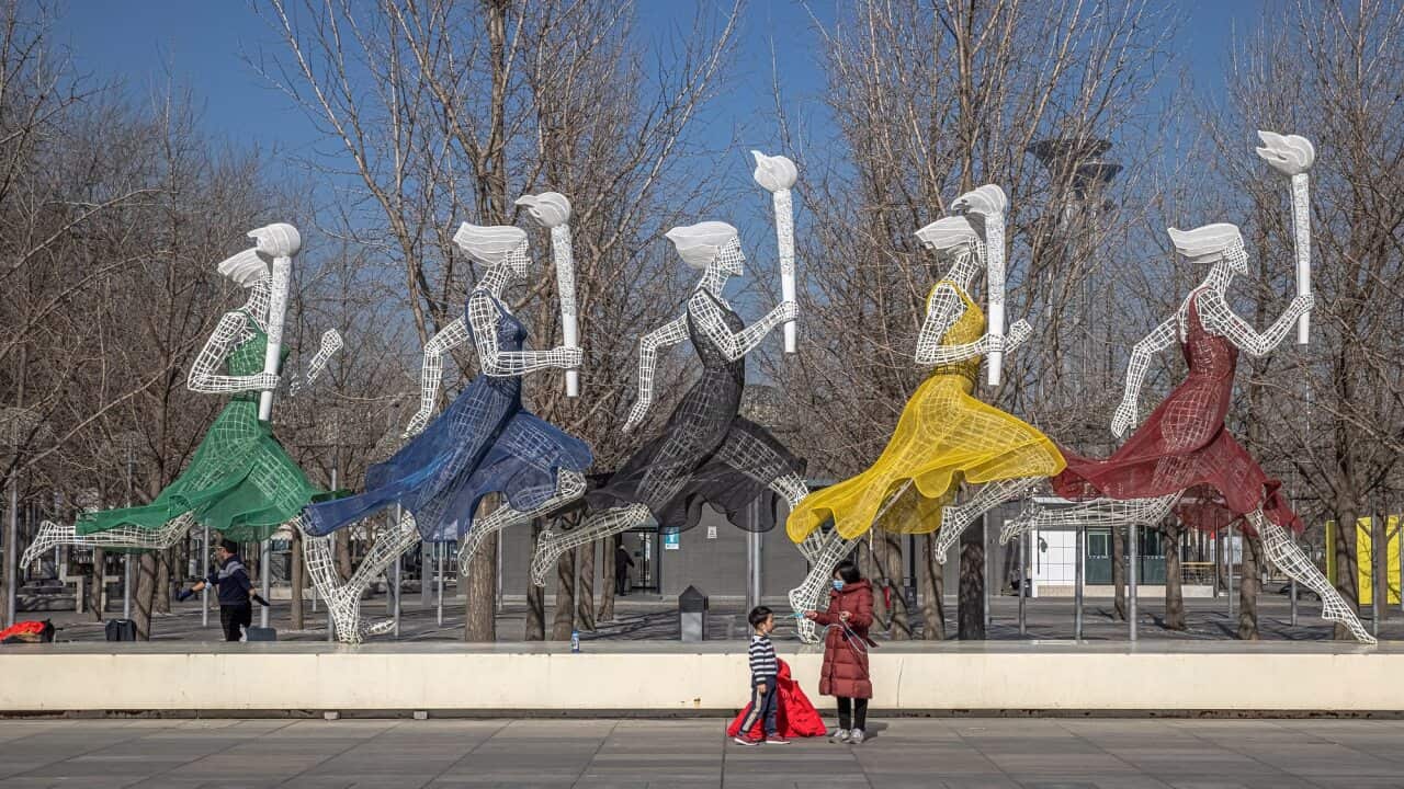 A woman with a young boy visit Beijing Olympic Park on 4 February 2021 - 365 days before the 2022 Beijing Winter Olympics.
