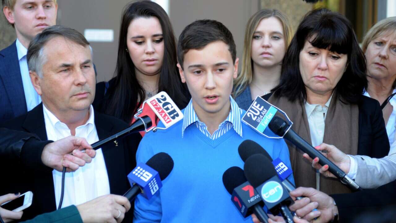 Ralph Kelly, Stuart Kelly and Kathy Kelly, left to right