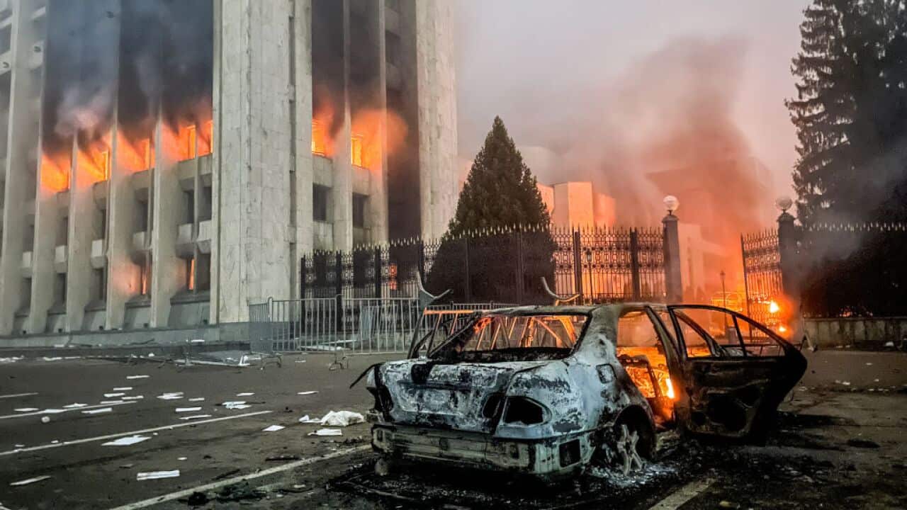 A burnt car is seen by the Almaty mayor's office on 5 January 2022