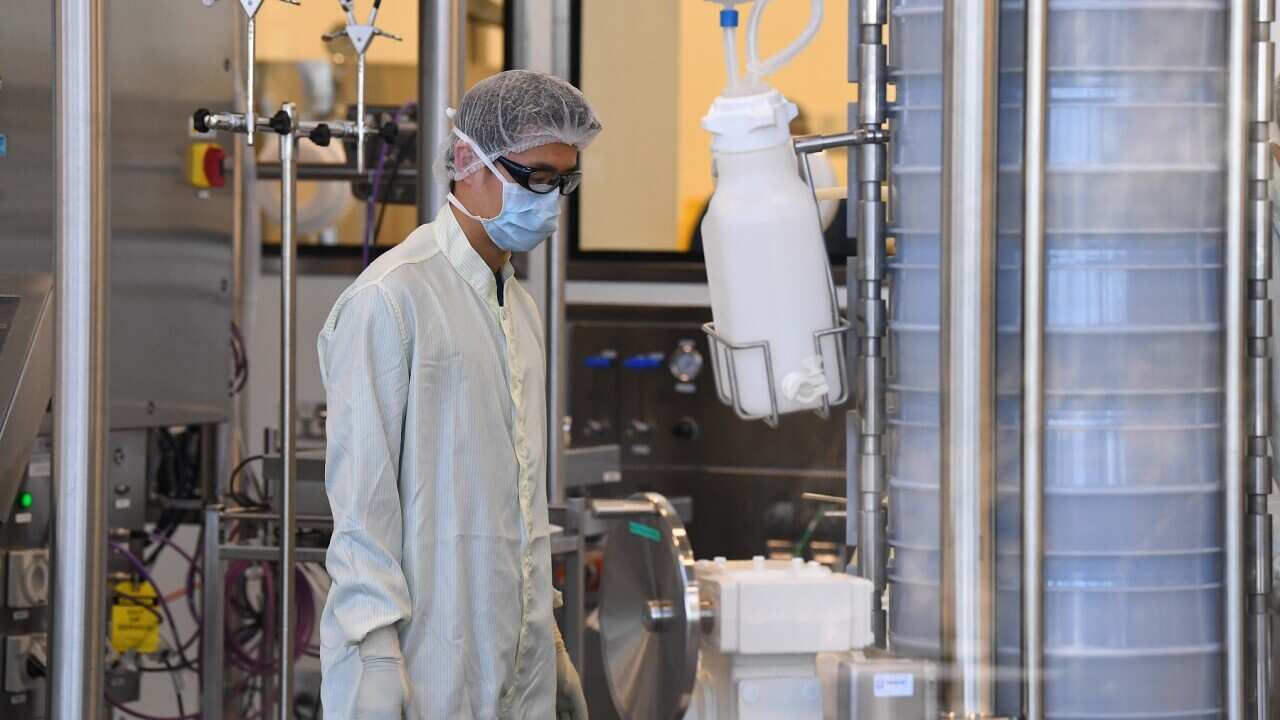 Scientists at work inside of the CSL Biotech facility in Melbourne, where a COVID vaccine is being produced (AAP)
