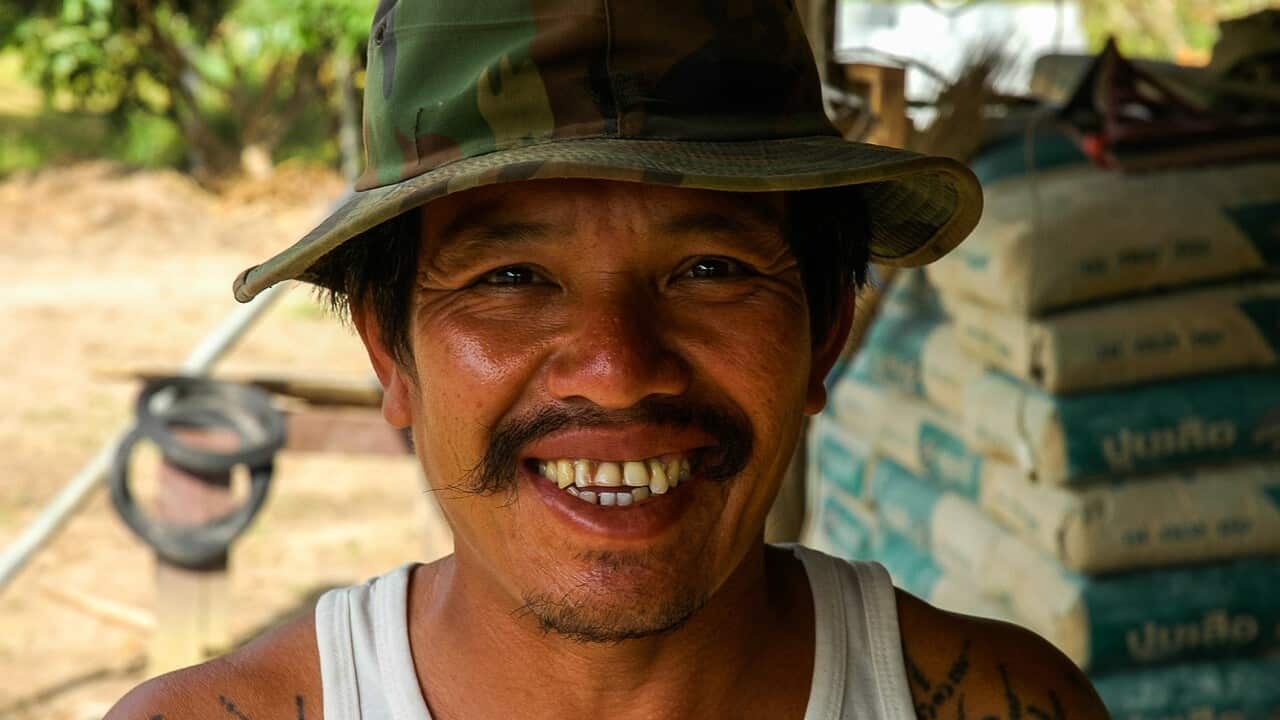 Smiling Thai worker - Pixabay