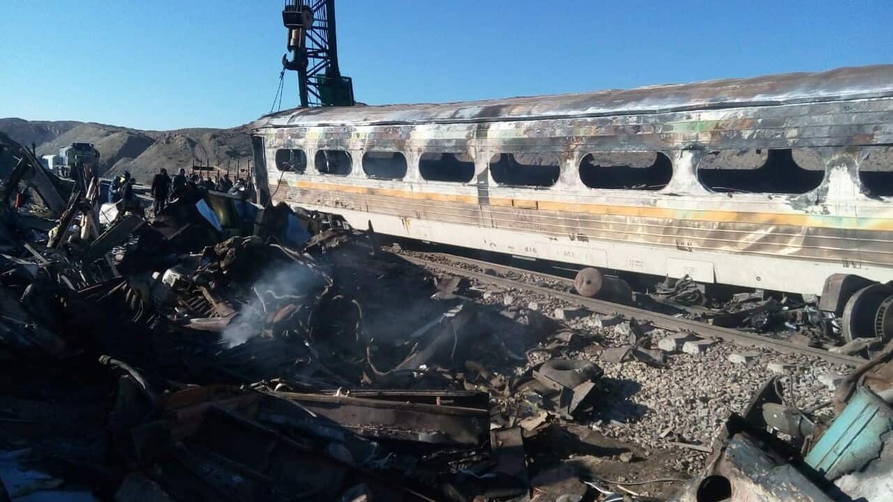 A destroyed train coach at the site of a train accident in the city of Semnan, central Iran