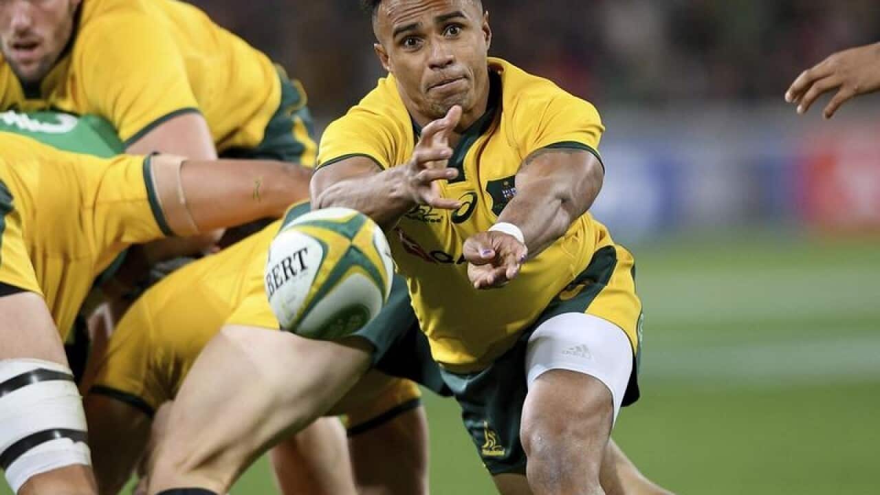 Will Genia passes the ball.