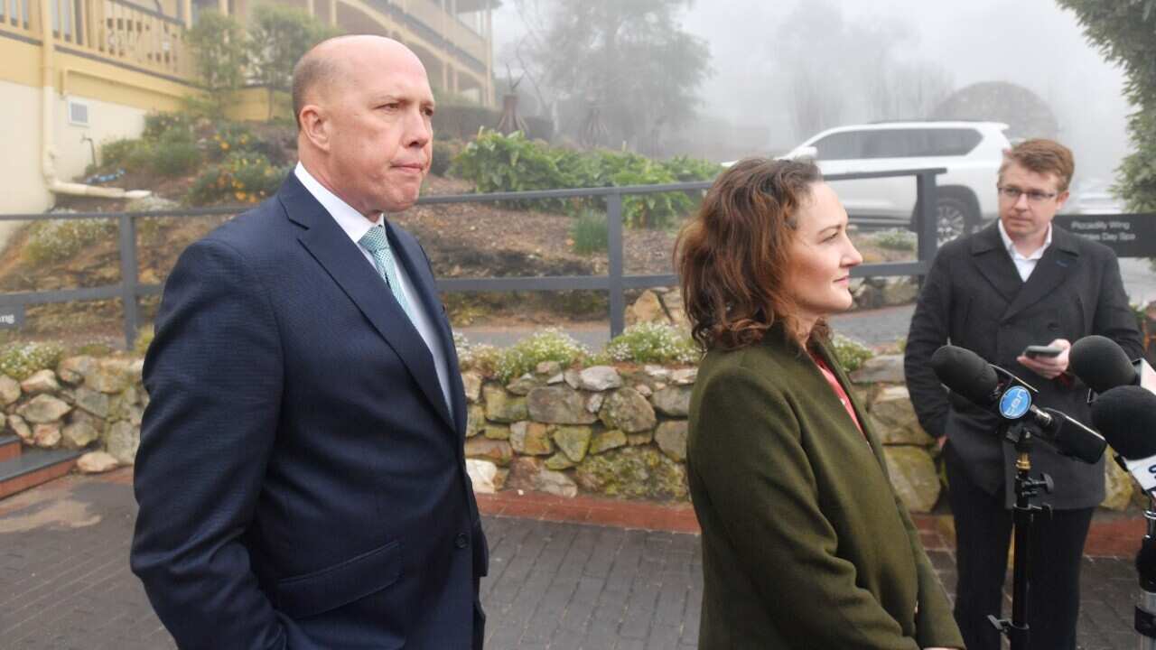 Liberal candidate for Mayo Georgina Downer is seen with the Minister for Immigration Peter Dutton at Mt Lofty House in Crafers, Adelaide on July 24.