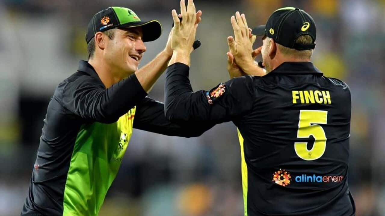 Australia's Aaron Finch (right) and Marcus Stoinis.