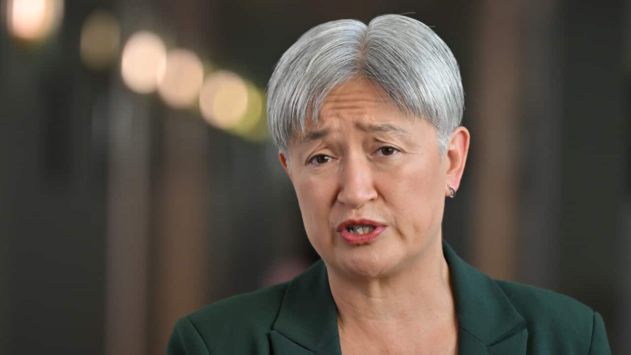 Foreign Minister Penny Wong speaking to journalists.