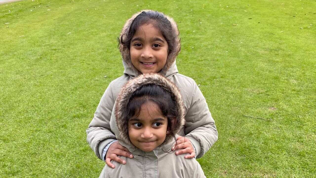 Sisters Kopika and Tharnicaa are shown in a photo shared by supporters.