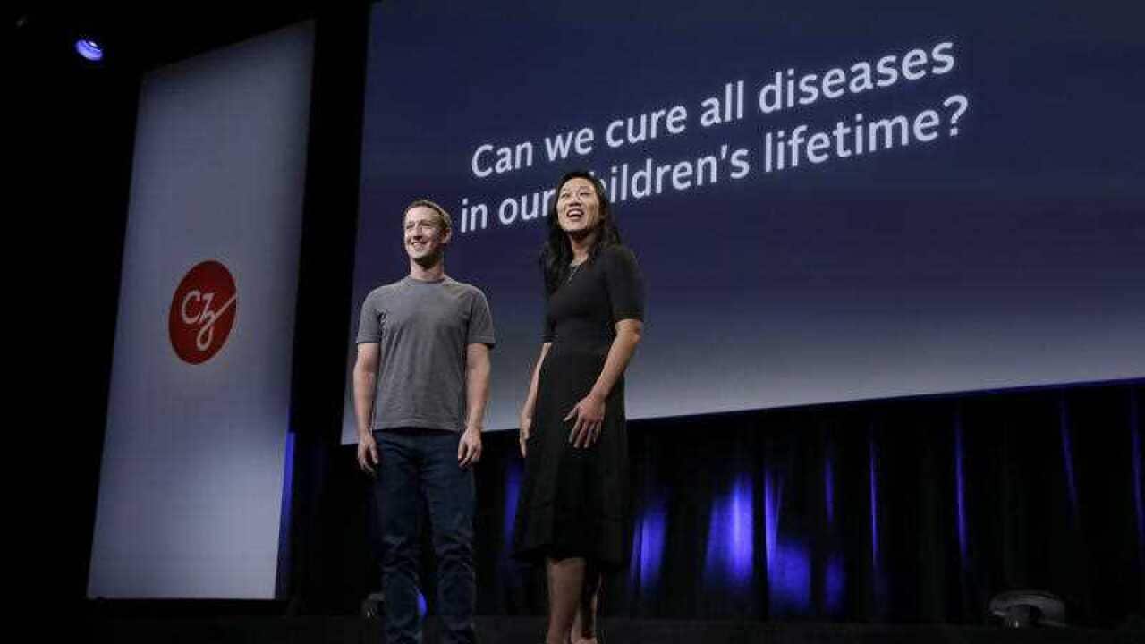 Facebook CEO Mark Zuckerberg, left, and his wife, Priscilla Chan