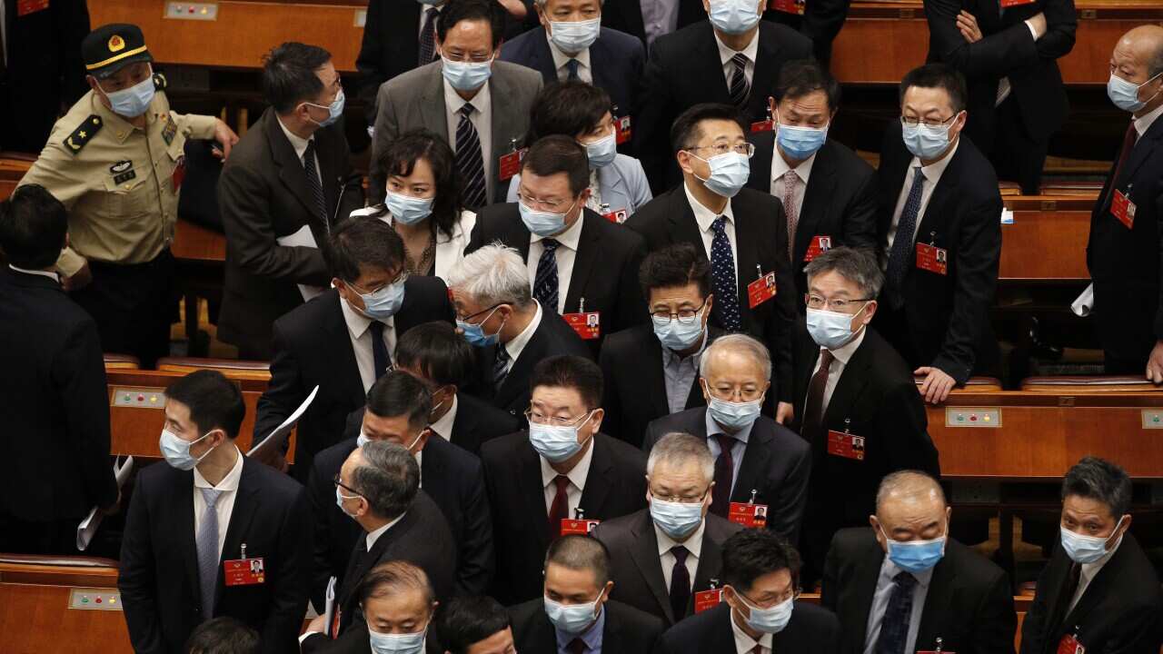 Delegates wearing face masks at the Chinese People's Political Consultative Conference in Beijing, Thursday, May 21, 2020