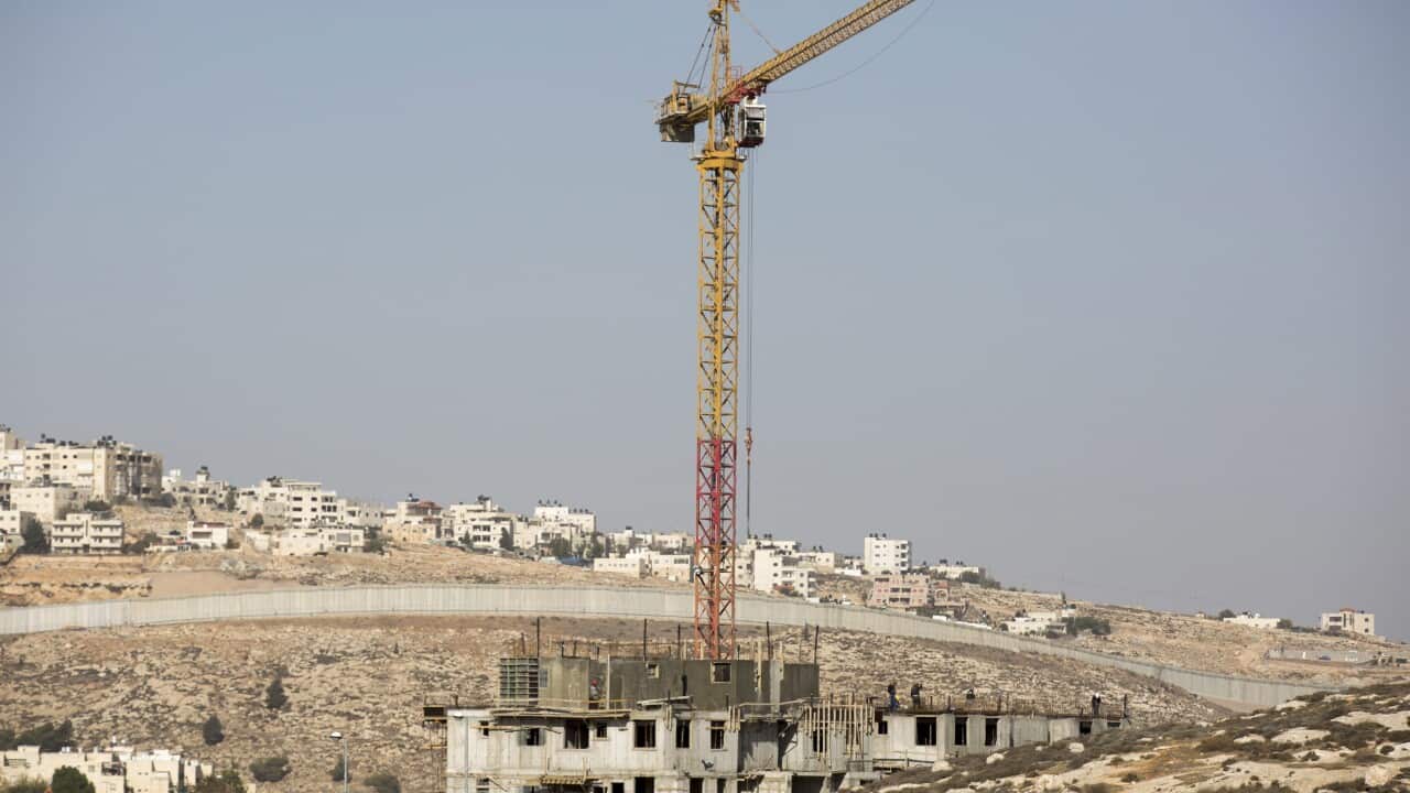 Buildings are under construction in the West Bank Israeli settlement of Pesqat Ze'ev, north of Jerusalem, 06 December 2016.