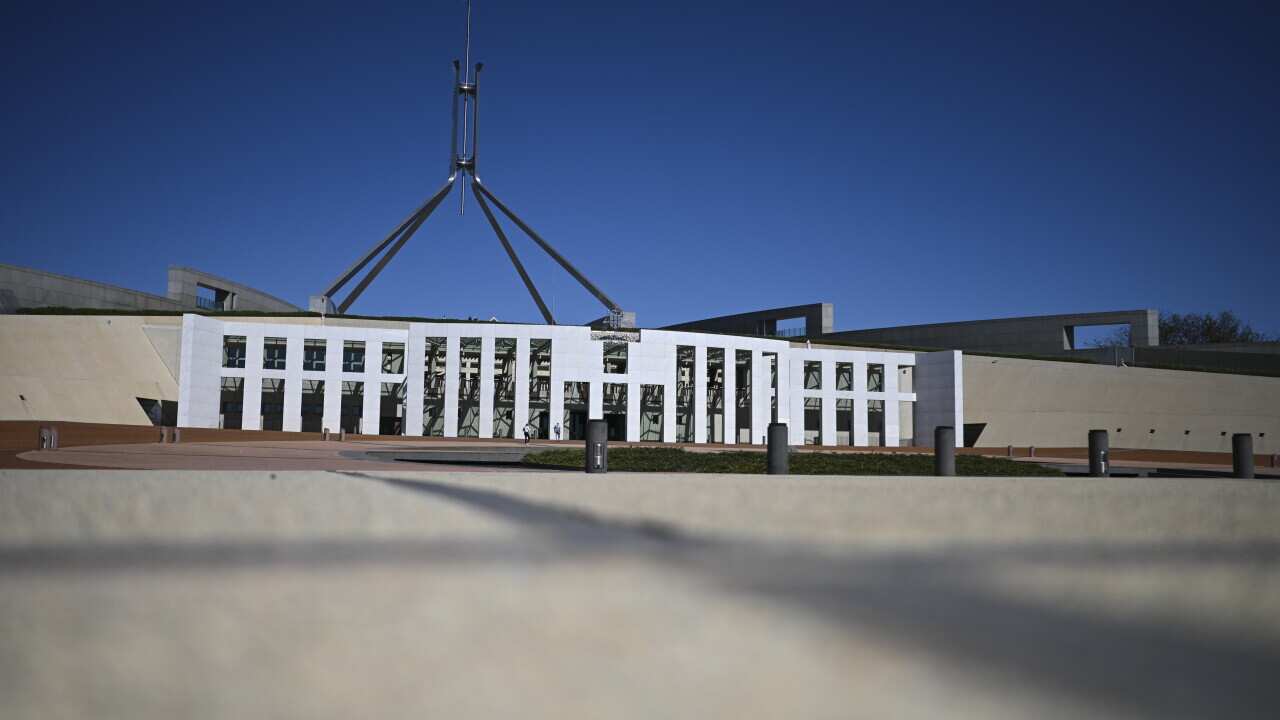 General view of Parliament House in Canberra, Friday, March 20, 2020. (AAP Image/Lukas Coch) NO ARCHIVING