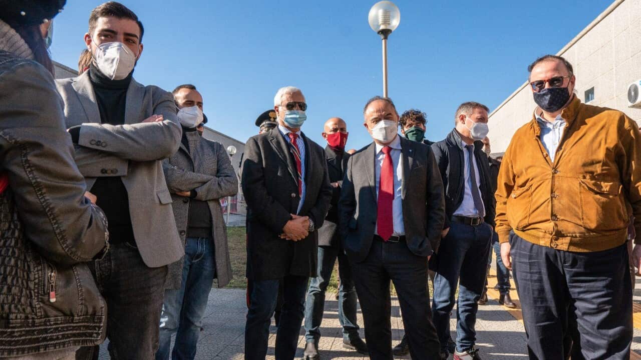 Nicola Gratteri (c), anti-mafia prosecutor seen with other people during the site inspection.
